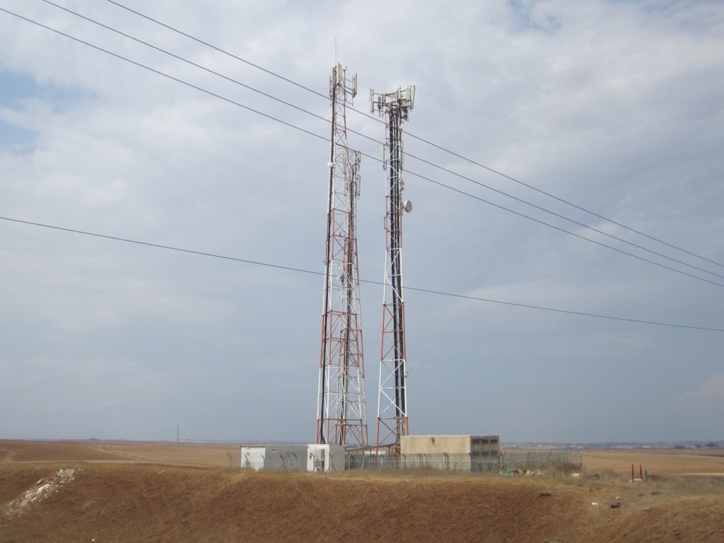 Antenna on buildings aside the road