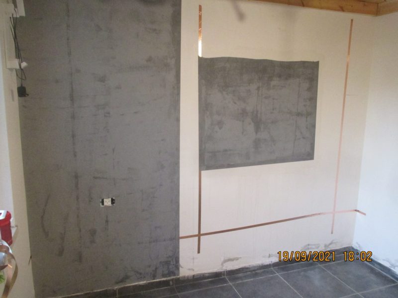 Wallpaper installation, 2 layers over the penetration point and a single layer over the rest of the wall